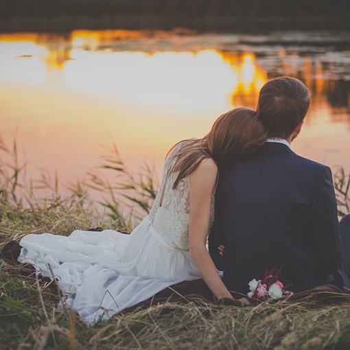 Bride & Groom overlooking lake