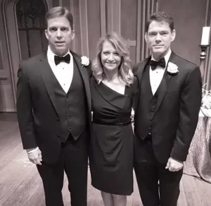 black and white photo of a Wedding Coordinator Indianapolis LGBTQ with two men in suites getting married