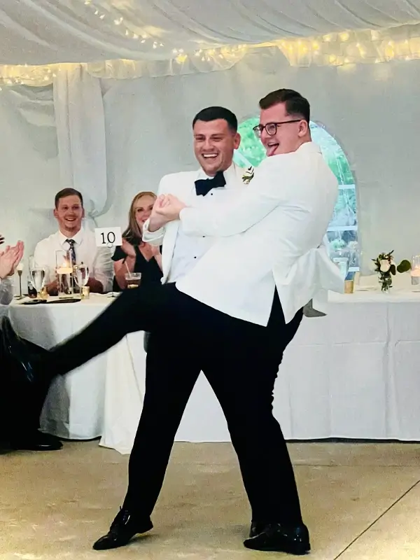 Indiana Pride Weddings - Two Grooms Celebrating at LGBTQ Wedding Reception Indiana Pride Weddings two grooms dancing at LGBTQ wedding reception - Weddings By Bretta