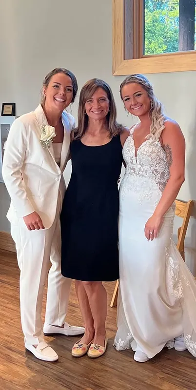 Indiana Pride Weddings officiant with same-sex couple at Sycamore venue - Weddings By Bretta