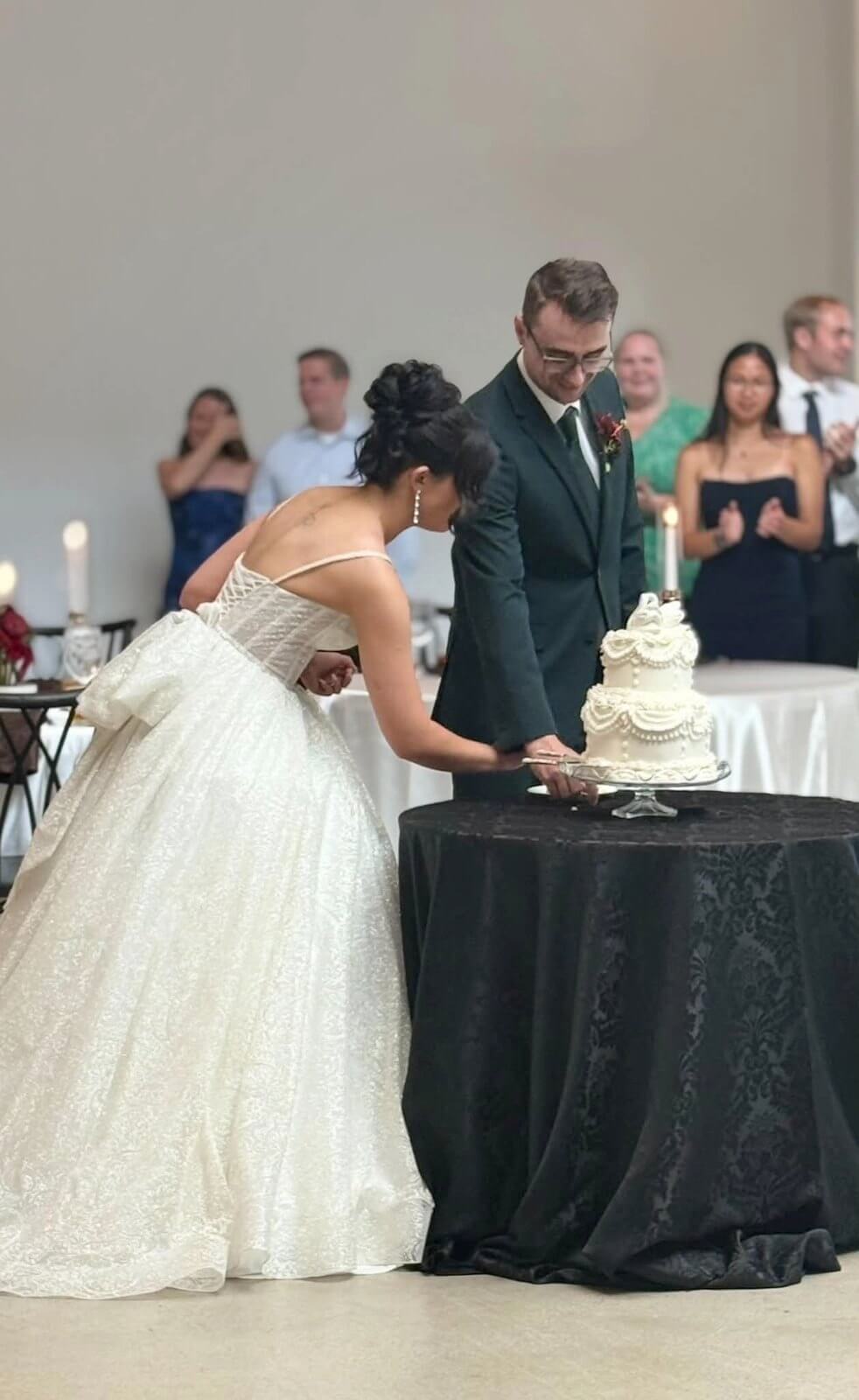 Bride and groom cutting their wedding cake at Westwood in Westfield